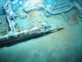 Remnants of motor and pipework in carvel built motor boat